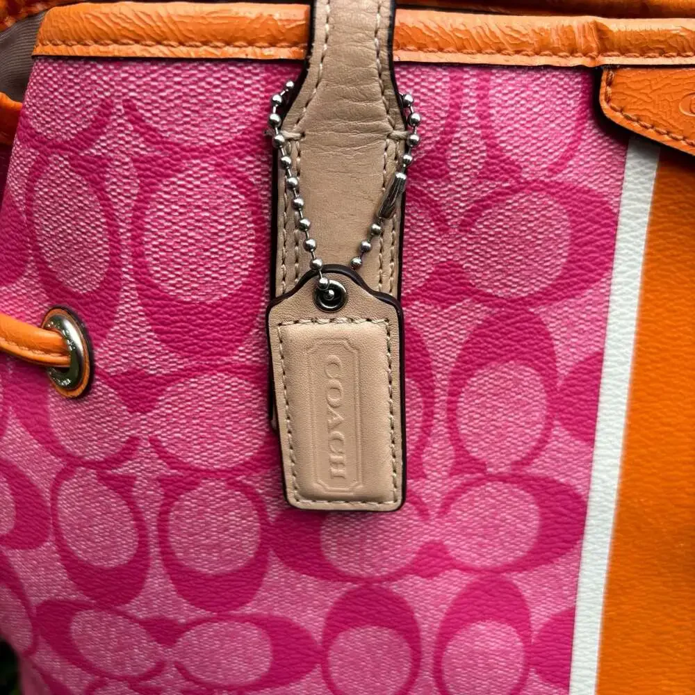 Coach Signature Canvas Drawstring Tote in Pink and Orange
